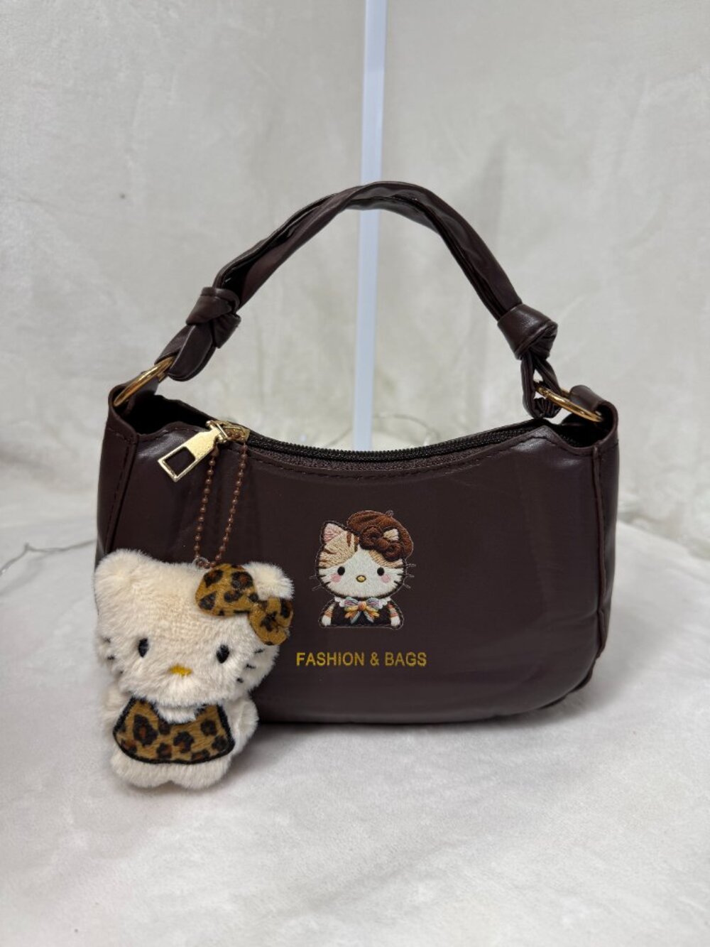 Hello Kitty Leopard Mini Bag with Plush Charm